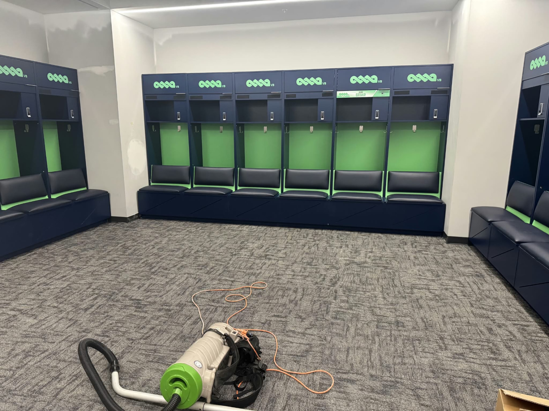 A freshly cleaned locker room with spotless carpet