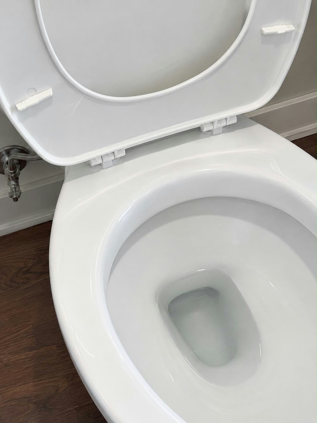 A spotless toilet after a detailed clean